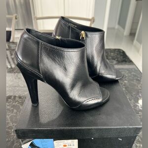 CHANEL Black Leather Heeled Boots